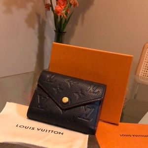 Authentic Louis Vuitton Wallet - with original box, dust bag, and receipt.